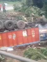 Scrap-loaded-truck-overturned-near-Meghatari-bridge-driver-narrowly-escaped-860x890