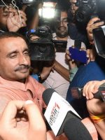 Lucknow: BJP MLA from Unnao Kuldip Singh Sengar, accused in a rape case, surrounded by media persons outside the office of the Senior Superintendent of Police in  Lucknow on Wednesday night. PTI Photo by Nand Kumar(PTI4_12_2018_000001B)